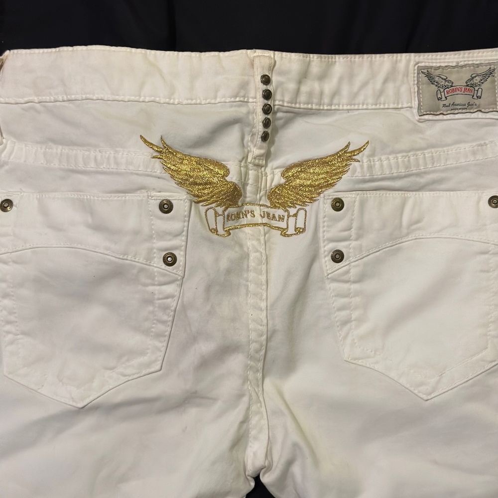Robin Jeans ALL white, due to keeping them in a box there are 2stains